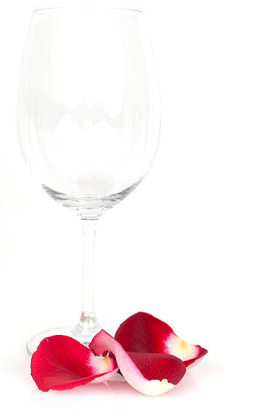 istock Red wine glass and petals 106439144