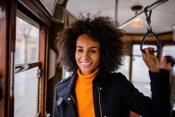 donna afroamericana al tram. - autobus italy foto e immagini stock