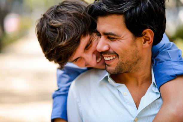 felice coppia gay. - alternative health care foto e immagini stock