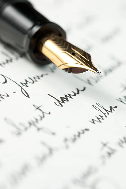 istock Gold fountain pen on hand written letter 106441648