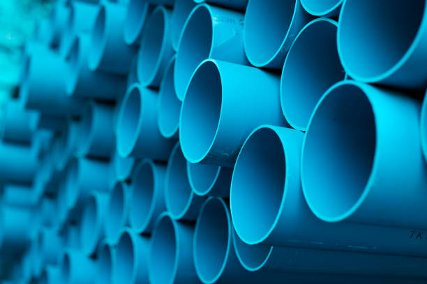 istock Blue PVC pipes stacked in construction site 1064422894