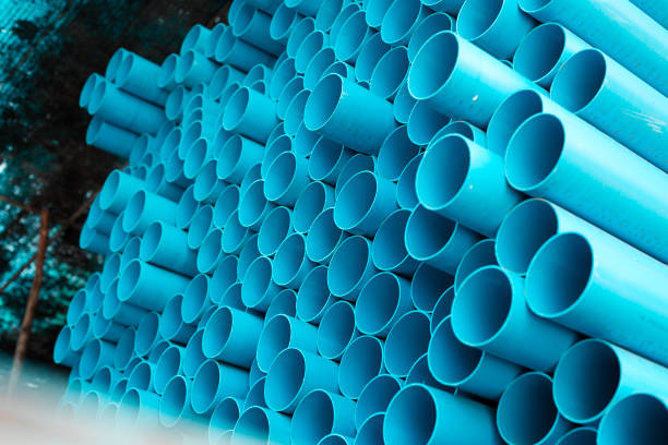 istock Blue PVC pipes stacked in construction site 1064422940