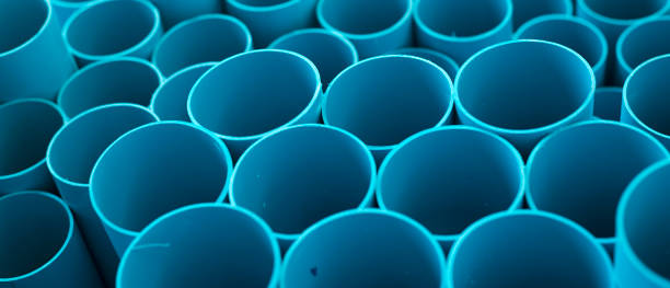 istock Blue PVC pipes stacked in construction site 1064422952