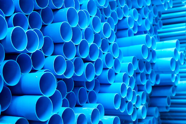 istock Blue PVC pipes stacked in construction site 1064422966