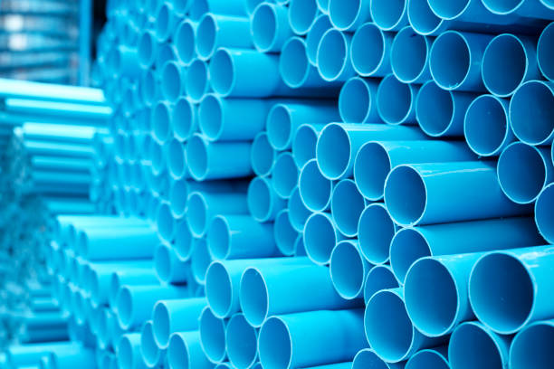 istock Blue PVC pipes stacked in construction site 1064422968