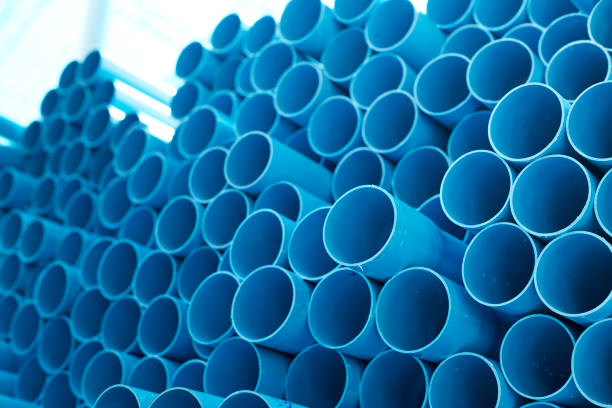 istock Blue PVC pipes stacked in construction site 1064423090
