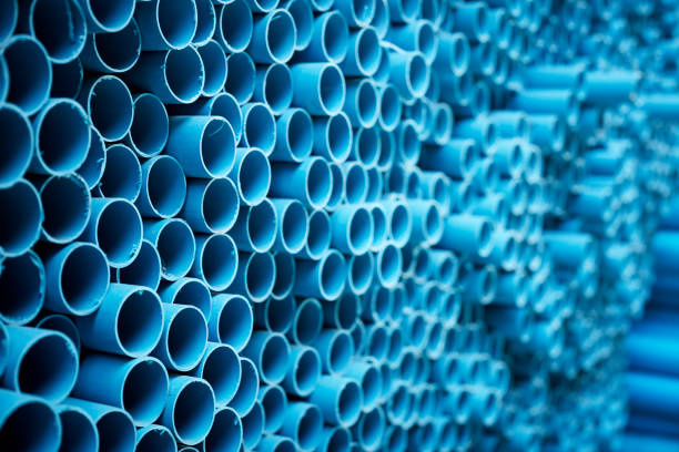 istock Blue PVC pipes stacked in construction site 1064423168