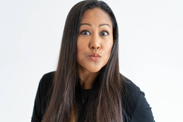 istock Surprised attractive middle-aged woman 1064428220