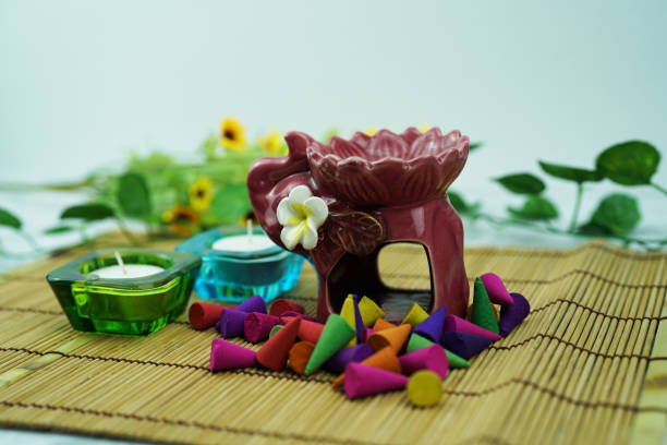 istock aroma stove and multi color of perfume incense 1064428512