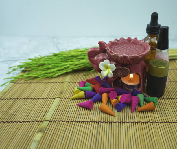 istock aroma stove and multi color of perfume incense 1064431348