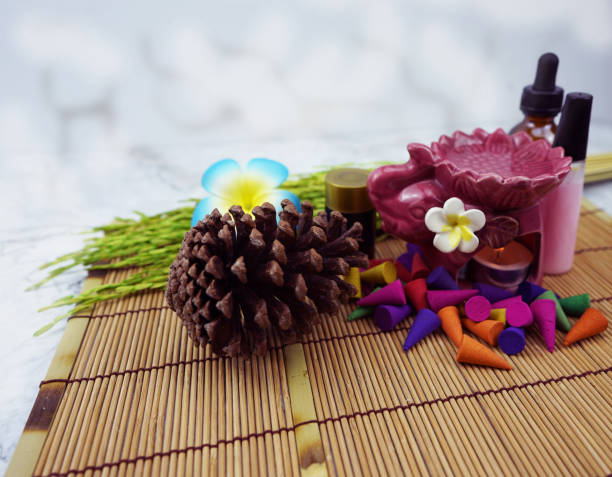 istock aroma stove and multi color of perfume incense with lighting effect 1064431408