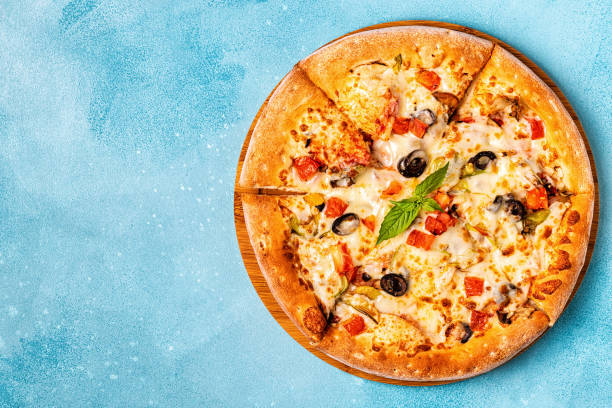 istock Vegetarian pizza with mushrooms, vegetables, cheese 1064440606