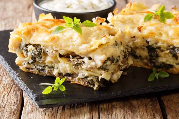 istock Homemade rustic lasagna with chicken, mushrooms, mozzarella and parmesan cheese and bechamel sauce closeup. horizontal 1064441864