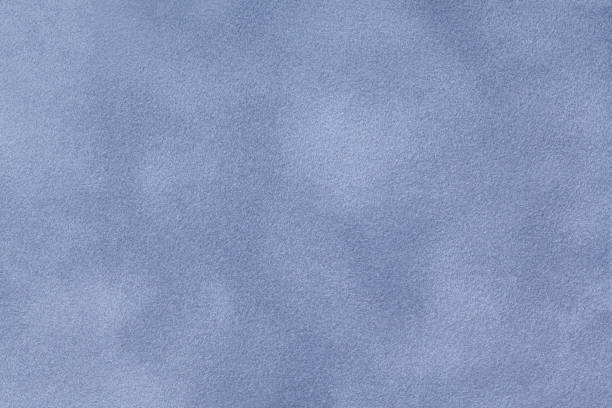istock Light blue matt suede fabric close-up. Velvet texture. 1064447346