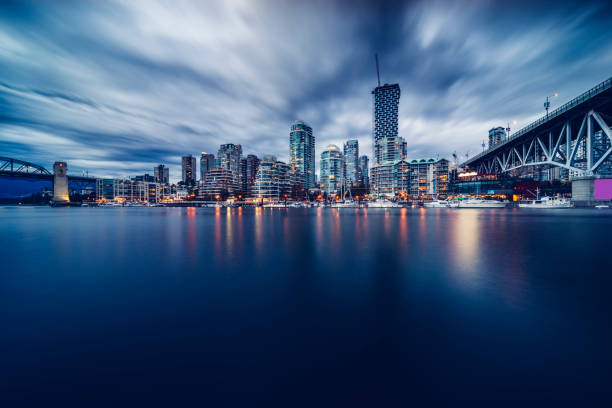 istock Vancouver waterfront skyline with granville bridge under storm clouds 1064452208