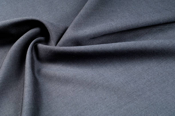 istock Background texture, pattern. cloth wool suit gray. A genuine flannel is always made of carded yarn, carded flannel is ideal in the cold months of the year, it is heavy, cozy and soft. 1064453468