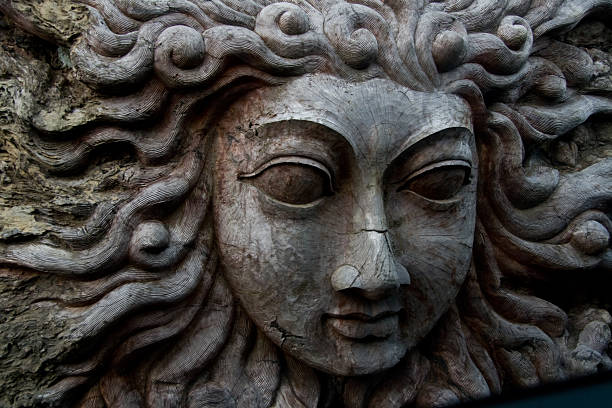 istock Sun or Hindu  wood carving 106445672
