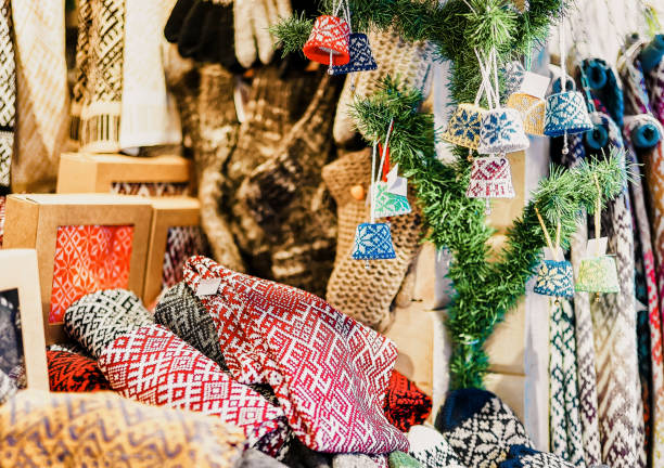 istock Ornamental warm clothes at stall during Riga Christmas fair 1064460628