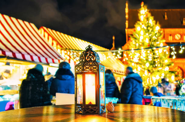at a christmas market, warm atmosphere of a market stall with a burning lantern