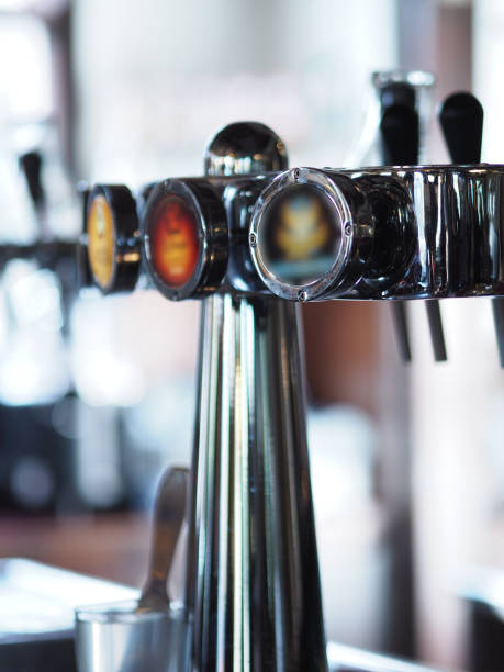 istock Mini Bar Glass hanging on brass rail. 1064461042