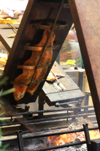 istock Smoking salmon over a wood fire 1064467026