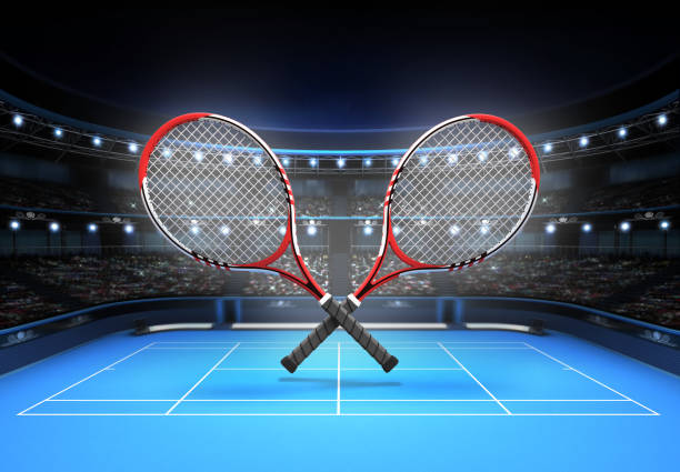 istock red and white tennis rackets placed over a blue court 1064467310