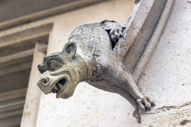 istock Gargoyles on the wall of a medieval building. 1064467940