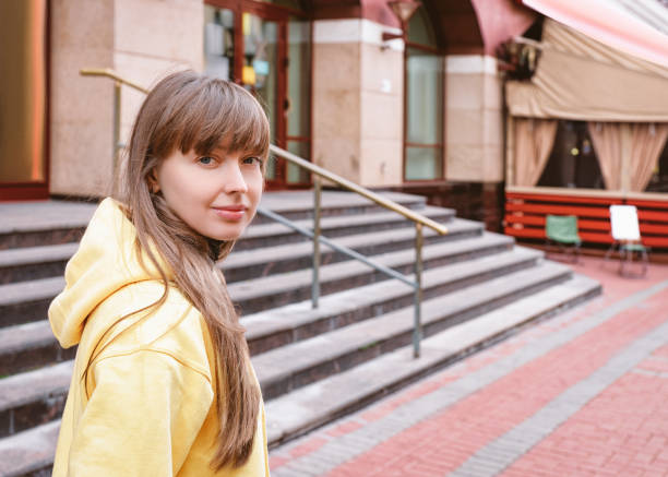 istock Young lady on Old Arbat Street in Moscow 1064470256
