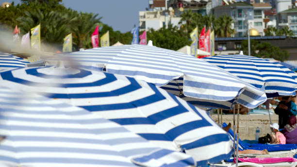 istock beach umbrella near the water 1064470478
