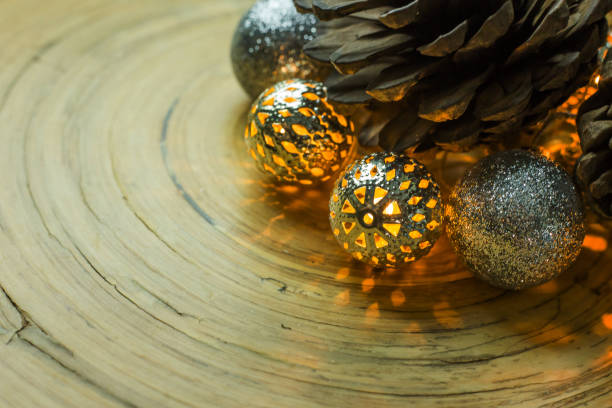 istock christmas ball and Pine cones  on wood  background. 1064471460