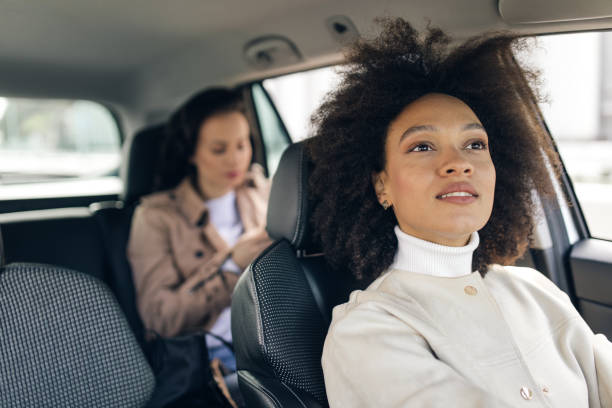 istock Beautiful woman in the car 1064477730