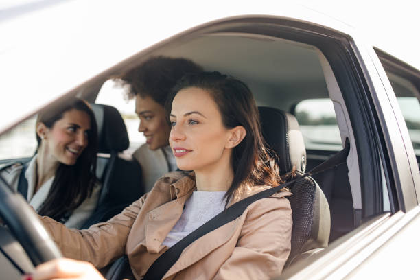 istock Three female friends in the car 1064477734