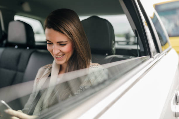 istock Beautiful woman in the car 1064478554