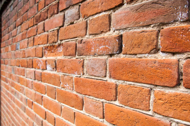 istock Fragment of Venetian old brick wall as background 1064478876