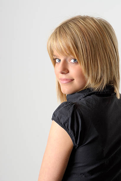 istock beautiful young blond woman looking over her shoulder 106448063