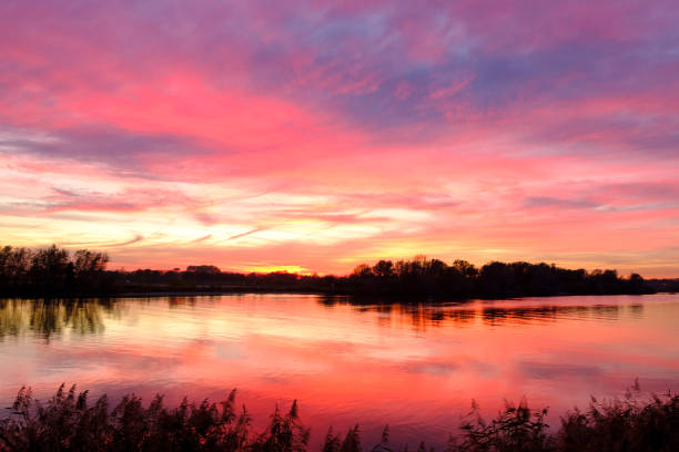 istock Majestic sunset over the river IJssel during a beautiful autumn evening 1064480916