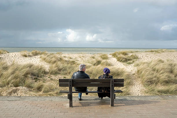 istock Sitting on a bench in front of the sea 106448204
