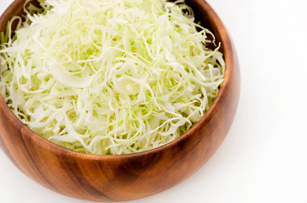 istock Shredded Cabbage in a wooden round bowl 1064492000