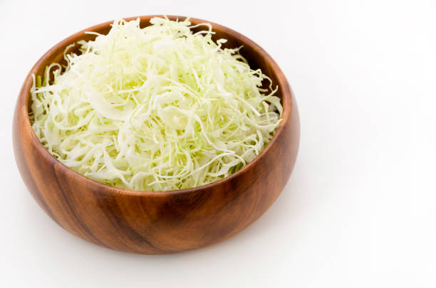 istock Shredded Cabbage in a wooden round bowl 1064492250