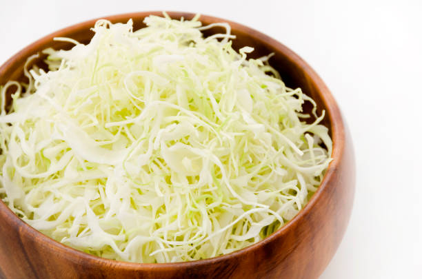 istock Shredded Cabbage in a wooden round bowl 1064492304