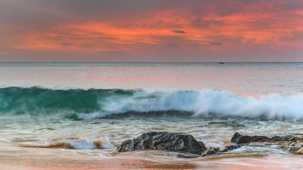 istock Rocky Sunrise at the Seaside 1064495788