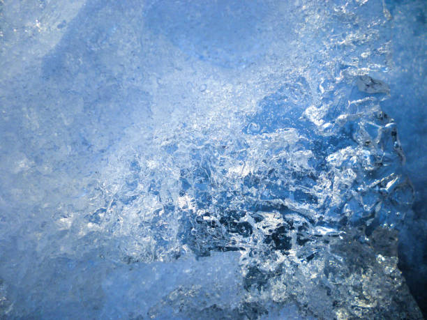 Close-up of cracked ice texture on river in spring time