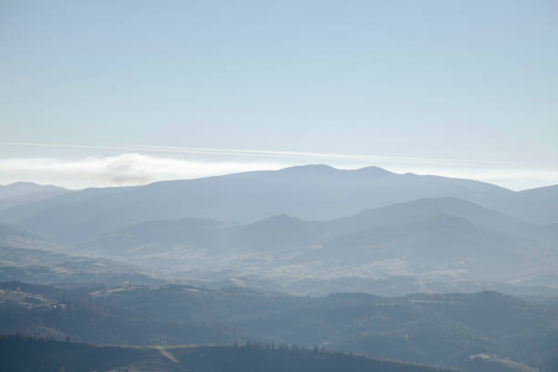 istock hazy mountains landscape, Carpathians, Ukraine 1064501682