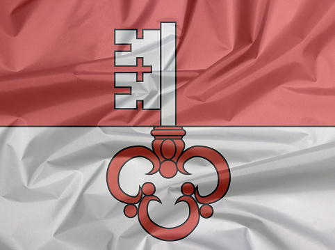 Fabric flag of Obwalden. Crease of Obwalden flag background, The canton of Switzerland Confederation.