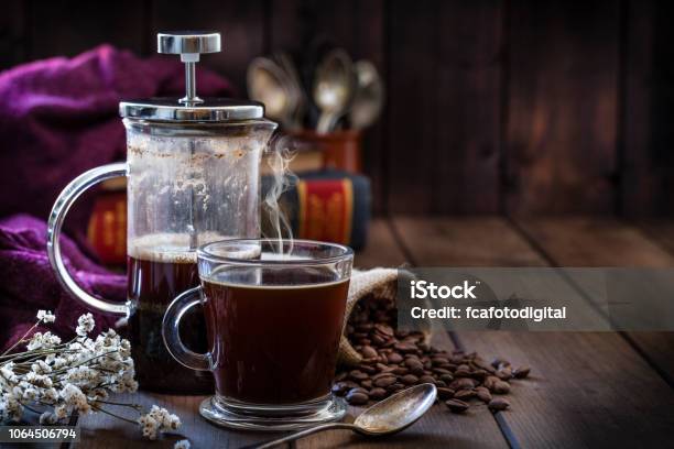 Coffee Backgrounds Coffee Cup And Coffee French Press On Rustic Wooden Table With Copy Space Stock Photo - Download Image Now