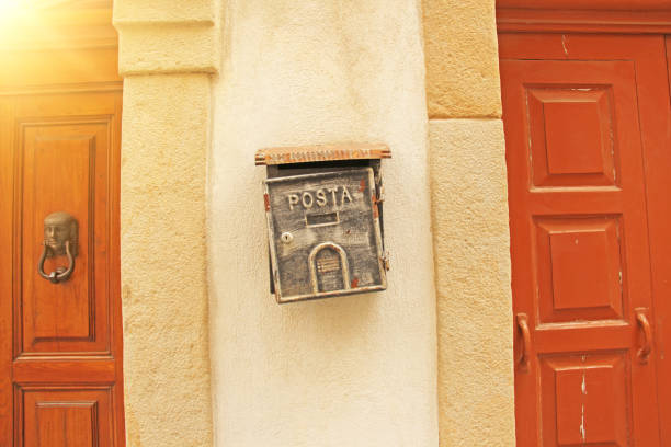 istock Street Mailbox Gray Color Hanging on the Wall. Posta 1064507252