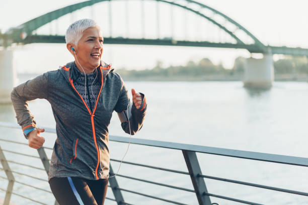 istock Athletic senior woman running 1064507608