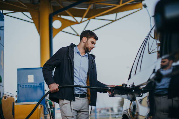 istock Young man at the gas station 1064518828