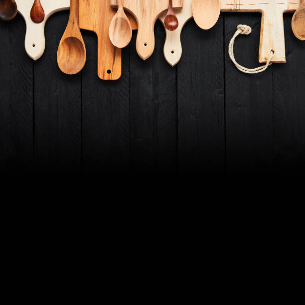 istock Assorted wooden spoons and chopping boards 1064520198