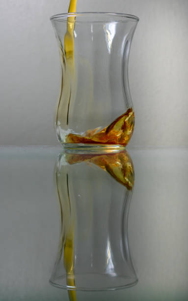 istock Pouring tea to a tea glass 1064522370